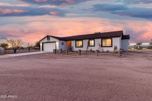 view of front of property featuring a garage