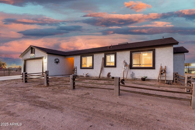 single story home featuring a garage