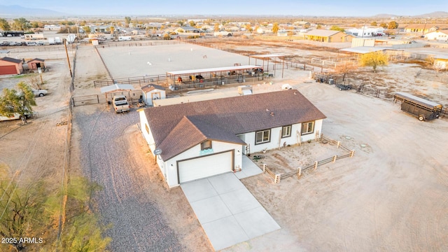 birds eye view of property featuring a mountain view