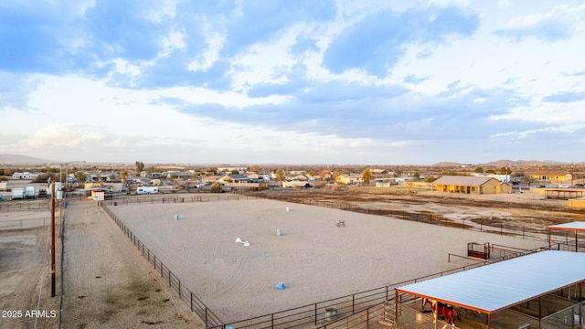 birds eye view of property featuring a mountain view