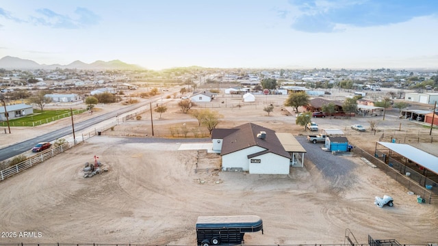 drone / aerial view featuring a mountain view