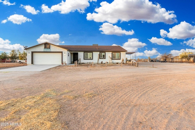 single story home featuring a garage