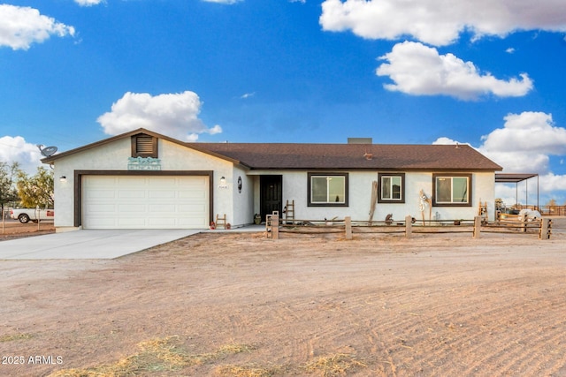 single story home featuring a garage