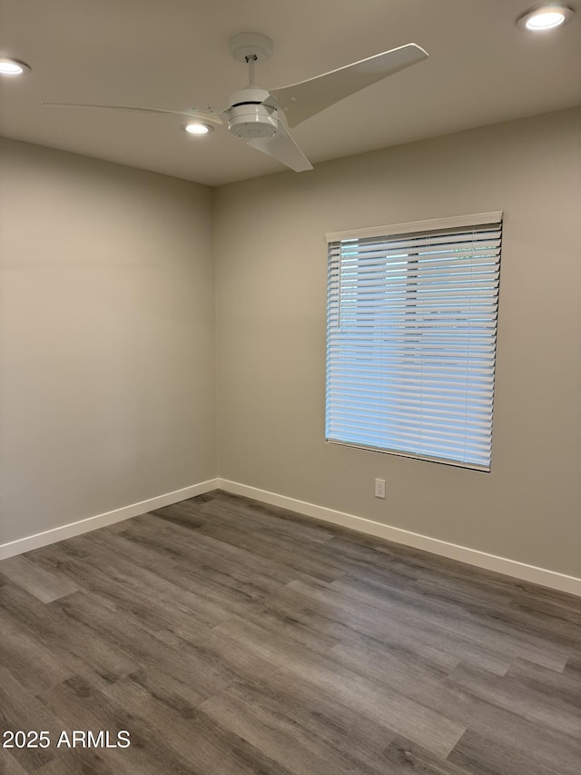 unfurnished room with recessed lighting, baseboards, dark wood finished floors, and a ceiling fan