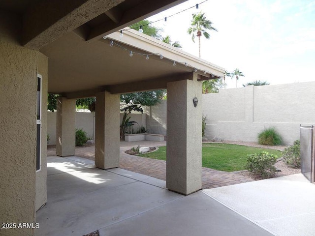 view of patio with a fenced backyard