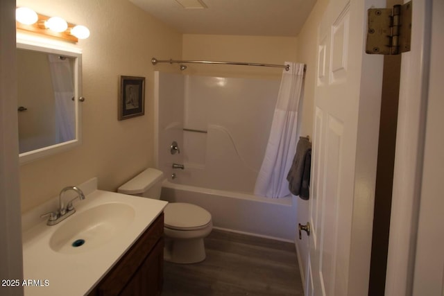 full bathroom featuring vanity, toilet, wood-type flooring, and shower / bath combo with shower curtain