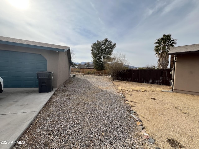 view of yard with a garage