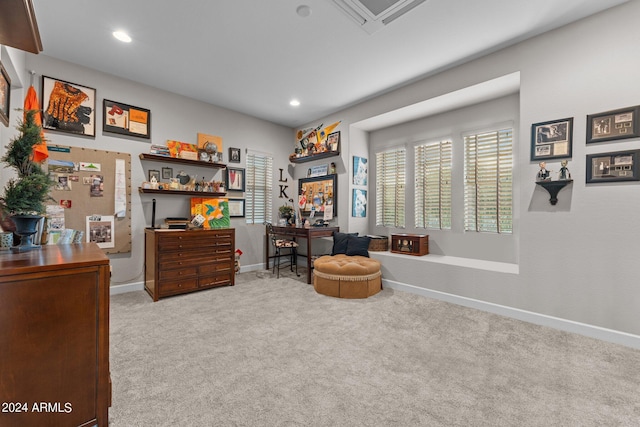 sitting room with light colored carpet