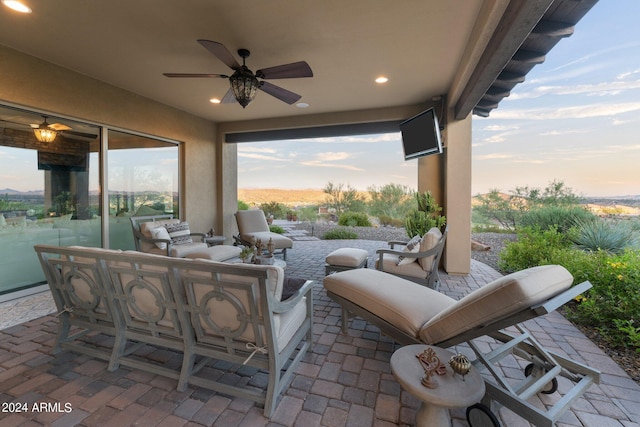 view of patio / terrace with ceiling fan and outdoor lounge area