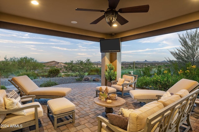 view of patio / terrace featuring an outdoor hangout area and ceiling fan