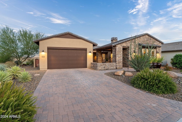 view of front of property with a garage