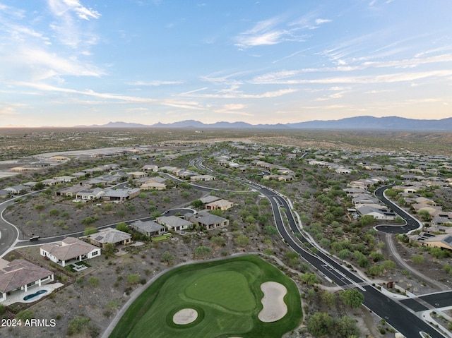 birds eye view of property featuring a mountain view