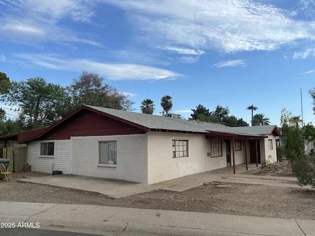 view of front of home with a patio area