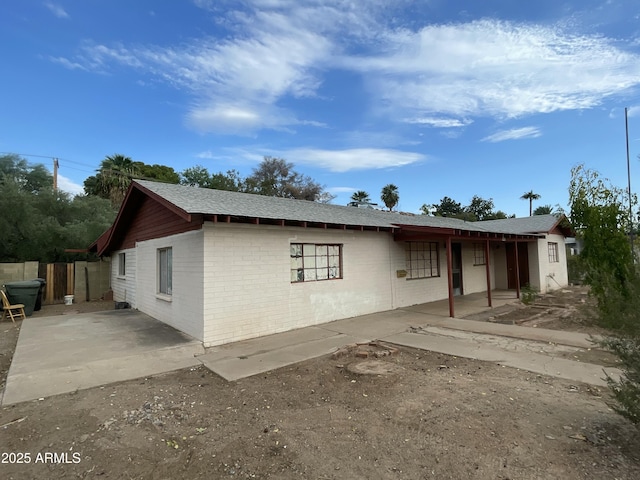 view of front of house with a patio area