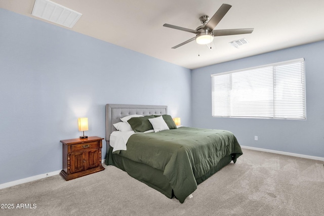 bedroom with light carpet and ceiling fan