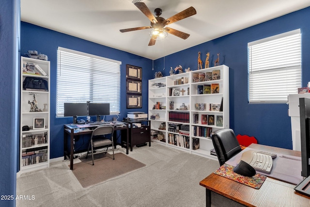 office space with carpet floors and ceiling fan