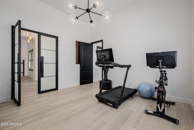 workout room with light wood-type flooring