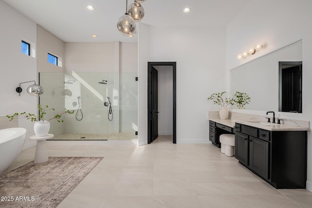 bathroom featuring vanity and plus walk in shower