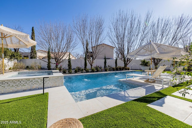 view of pool featuring an in ground hot tub, pool water feature, and a patio area