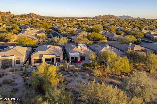 drone / aerial view featuring a mountain view