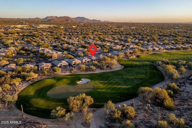 aerial view at dusk with a mountain view