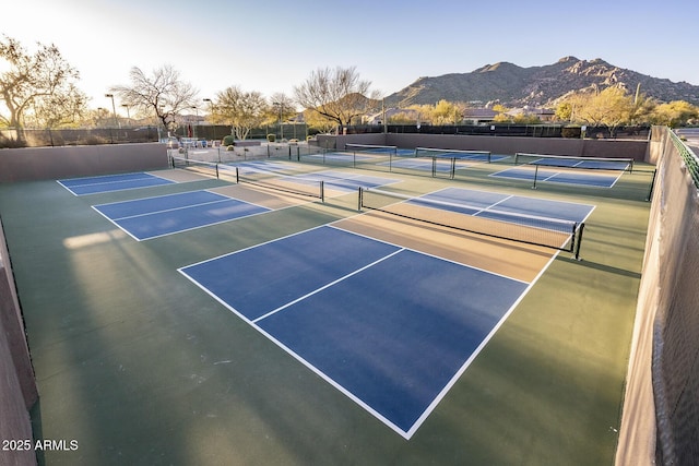 view of sport court with a mountain view