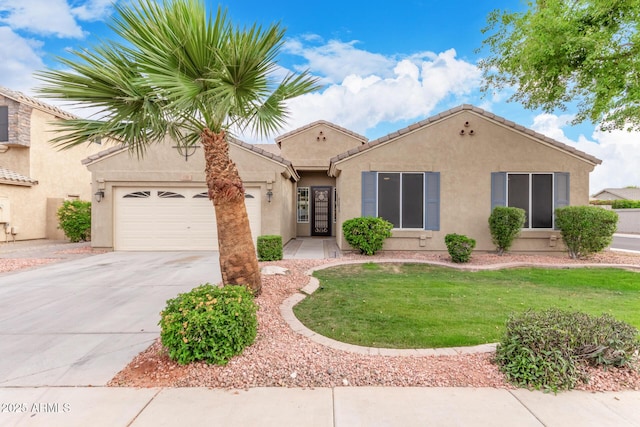 139 E Gail Dr, Gilbert, AZ 85296 - view of front of home with a garage, stucco siding, concrete driveway, a front lawn, and a tiled roof