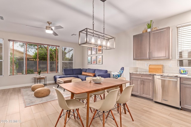 139 E Gail Dr, Gilbert, AZ 85296 - dining space featuring plenty of natural light, ceiling fan, baseboards, and light wood-style flooring
