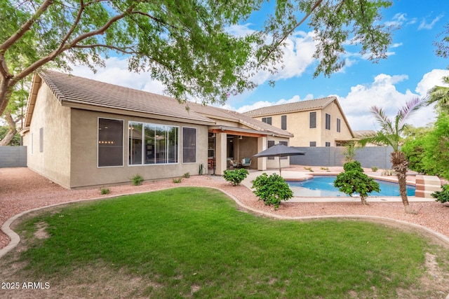 139 E Gail Dr, Gilbert, AZ 85296 - rear view of house with stucco siding, a patio area, and a tiled roof