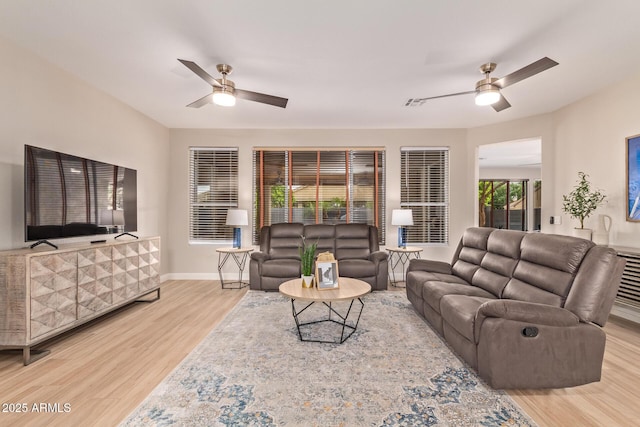 139 E Gail Dr, Gilbert, AZ 85296 - living area with ceiling fan, wood finished floors, and baseboards