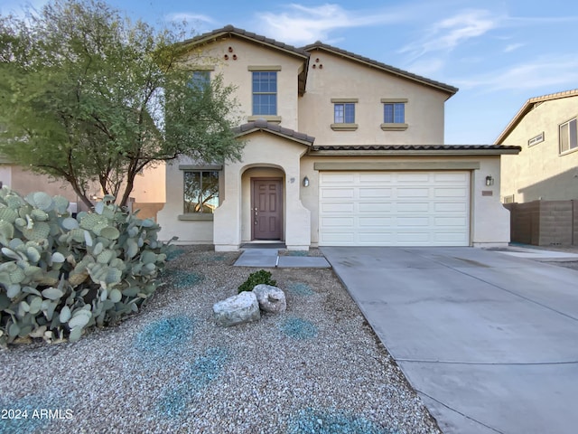 view of front of property with a garage