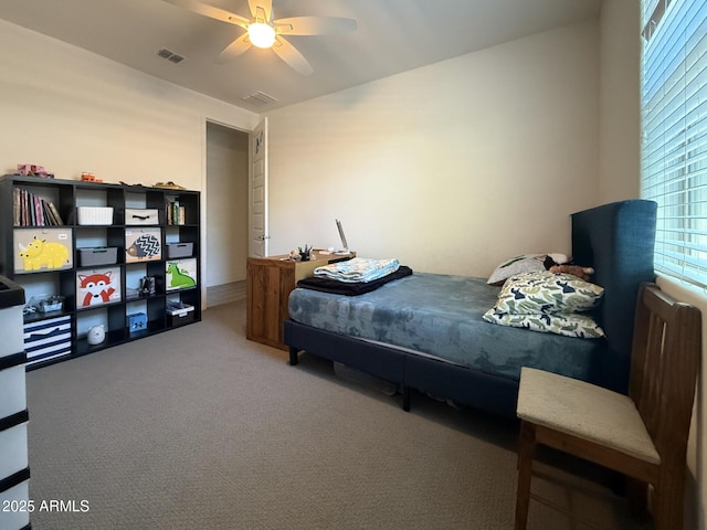 2727 N Acacia Way, Buckeye, AZ 85396 - carpeted bedroom with a ceiling fan