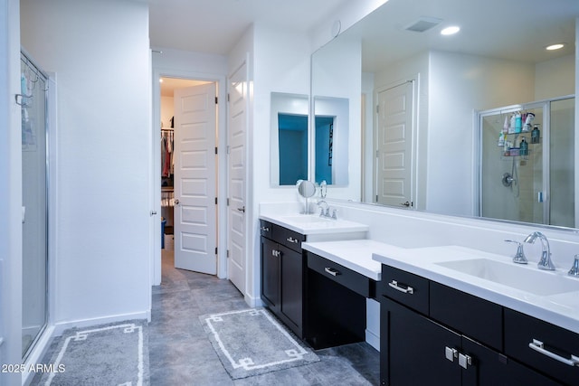 2727 N Acacia Way, Buckeye, AZ 85396 - full bathroom with a stall shower, a walk in closet, vanity, and recessed lighting