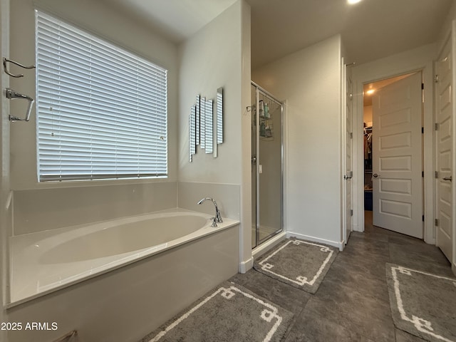 2727 N Acacia Way, Buckeye, AZ 85396 - bathroom with a stall shower, a bath, and a spacious closet