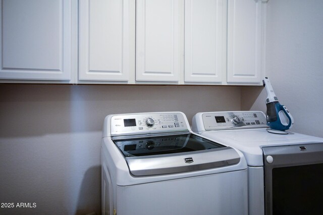 2727 N Acacia Way, Buckeye, AZ 85396 - laundry room featuring independent washer and dryer and cabinet space