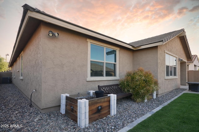 2727 N Acacia Way, Buckeye, AZ 85396 - view of home's exterior with stucco siding and central AC unit