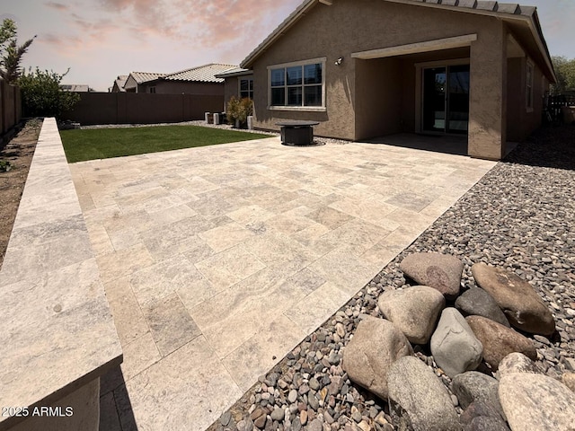 2727 N Acacia Way, Buckeye, AZ 85396 - back of property featuring stucco siding and a patio area