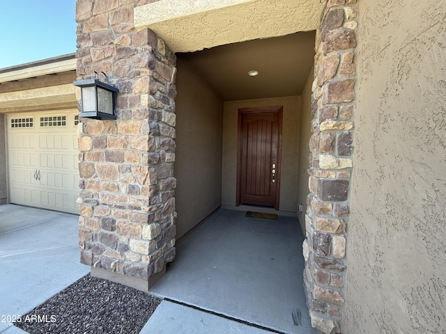 2727 N Acacia Way, Buckeye, AZ 85396 - doorway to property with stone siding and stucco siding