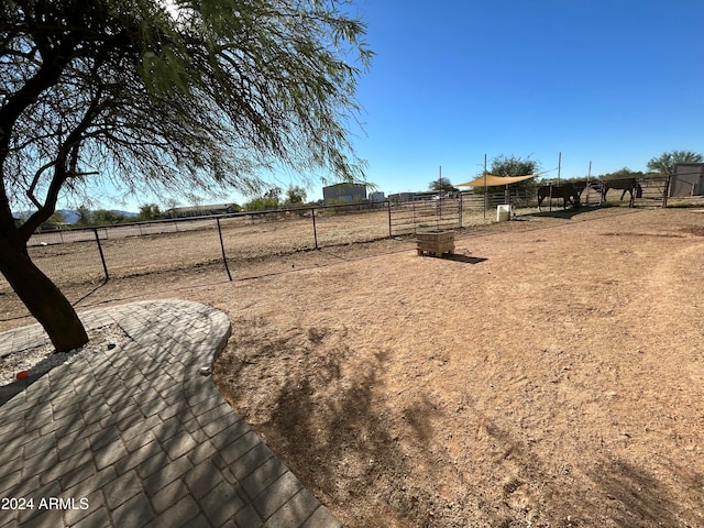 view of yard featuring a rural view