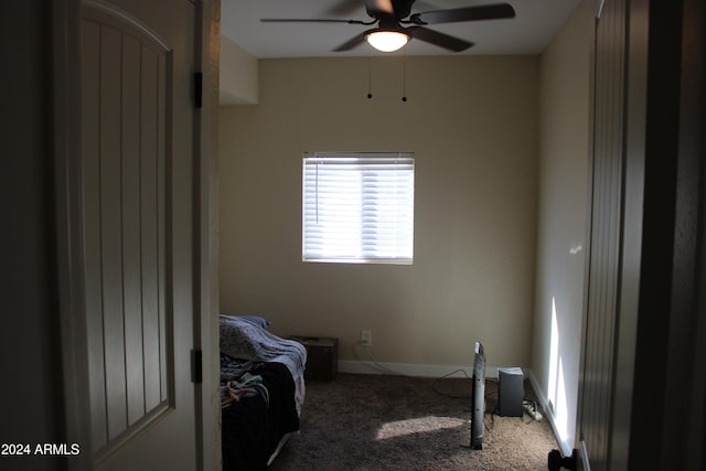 bedroom with ceiling fan and carpet flooring