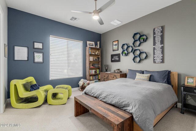 bedroom with ceiling fan and carpet floors