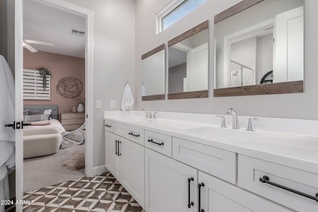 bathroom featuring vanity and ceiling fan