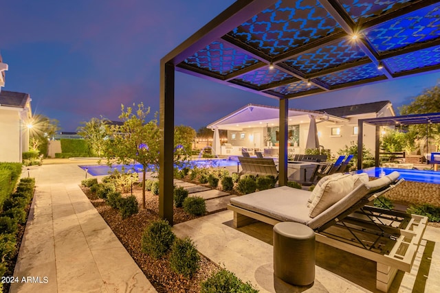 patio terrace at dusk with area for grilling