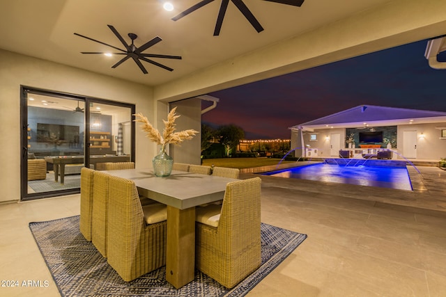 tiled dining space with ceiling fan