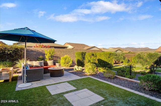 view of patio with a fire pit