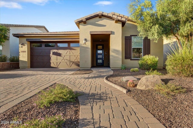 view of front of home featuring a garage