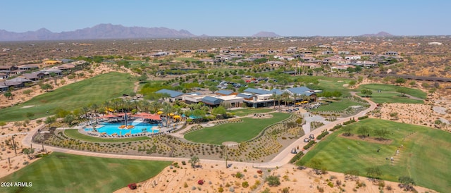 birds eye view of property featuring a mountain view