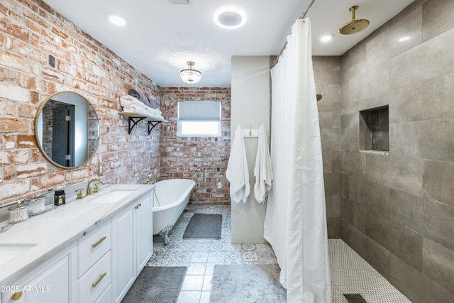 bathroom featuring vanity, tile patterned floors, shower with separate bathtub, and brick wall