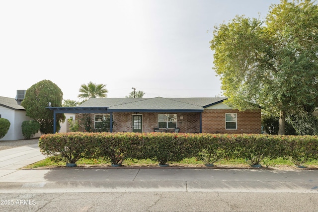 ranch-style house featuring central AC