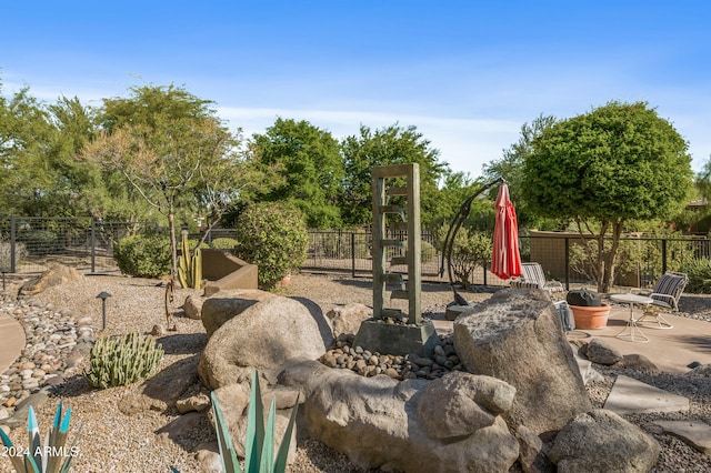 view of playground featuring a patio